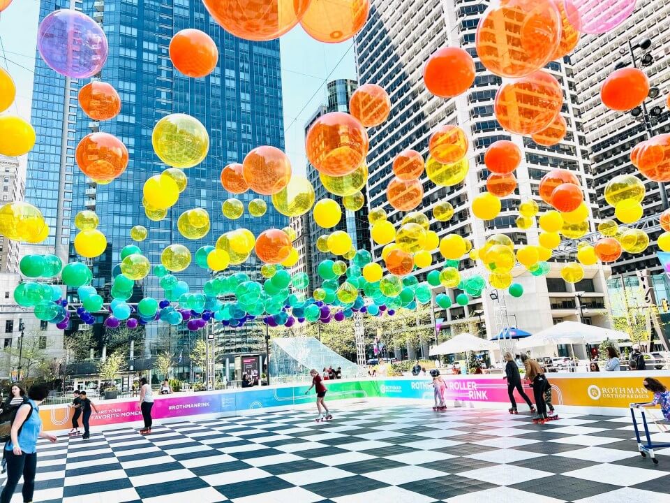 Hosts Global | Skating in the City under colorful balls