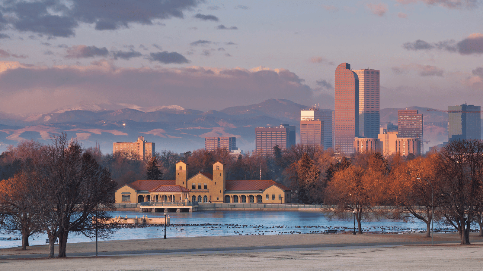 Hosts Global | Denver Colorado Skyline in fall with mountains in the background