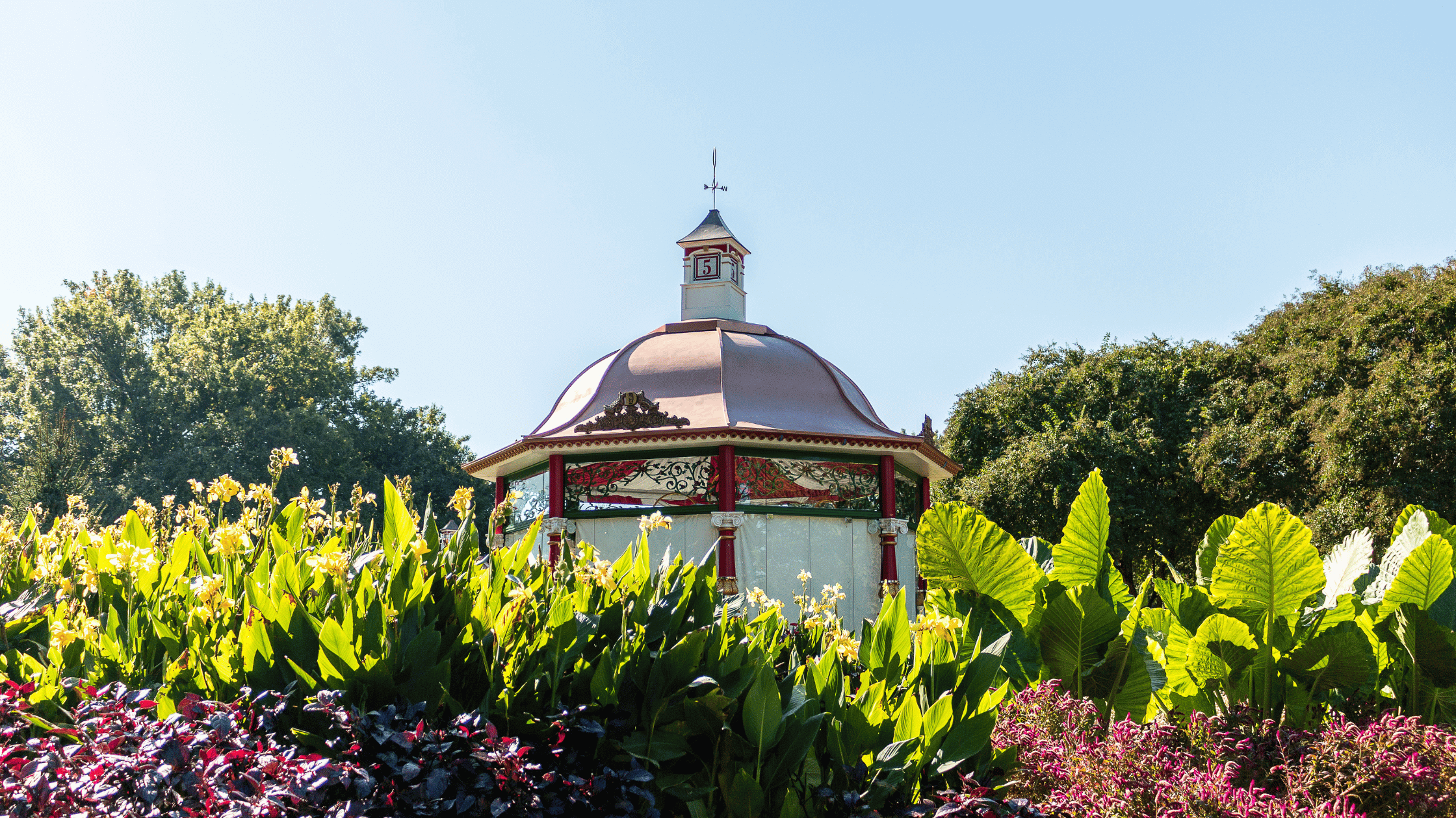 a gazebo with a cross on top