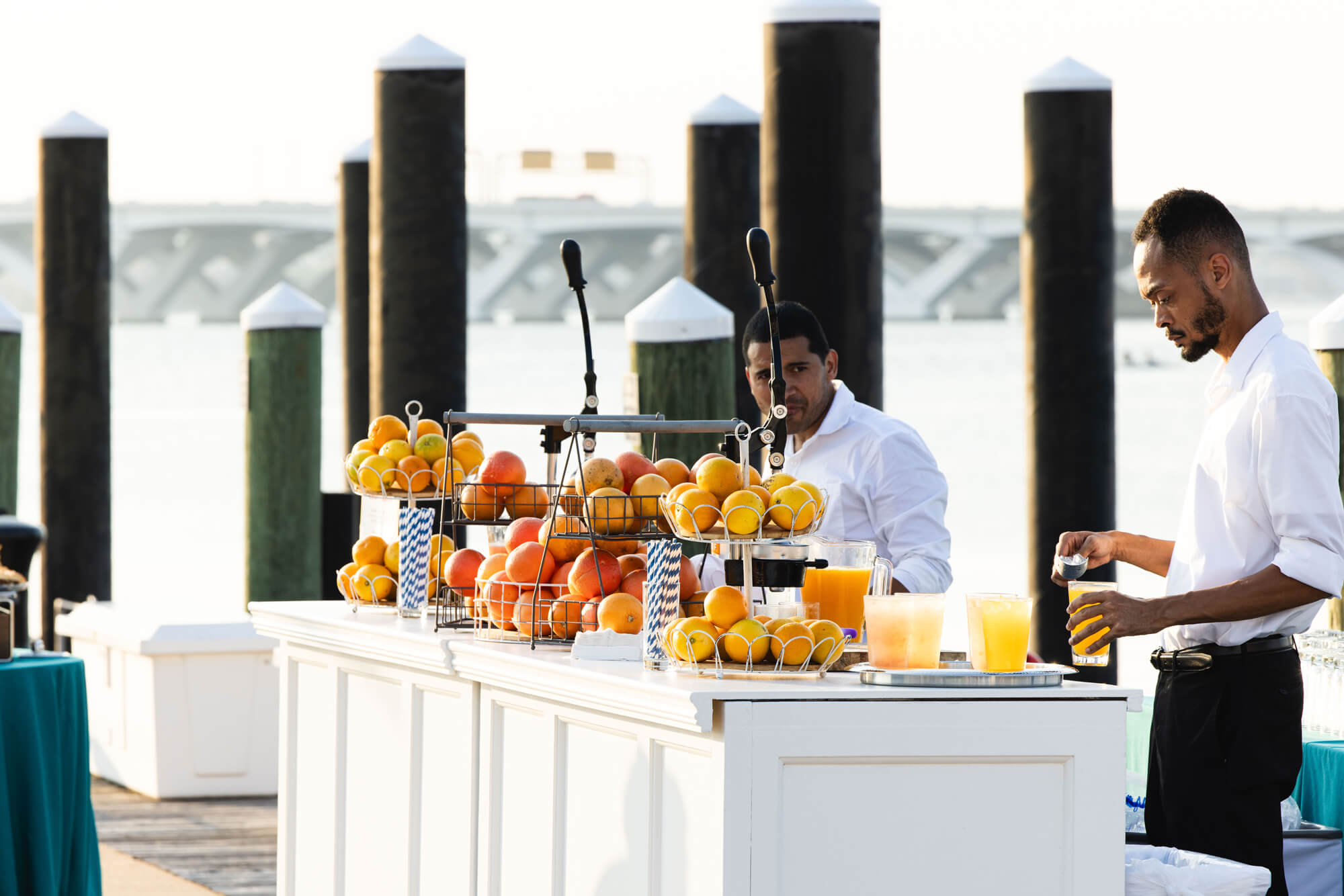 Juice Bar outside with attendants making fresh juice cocktails