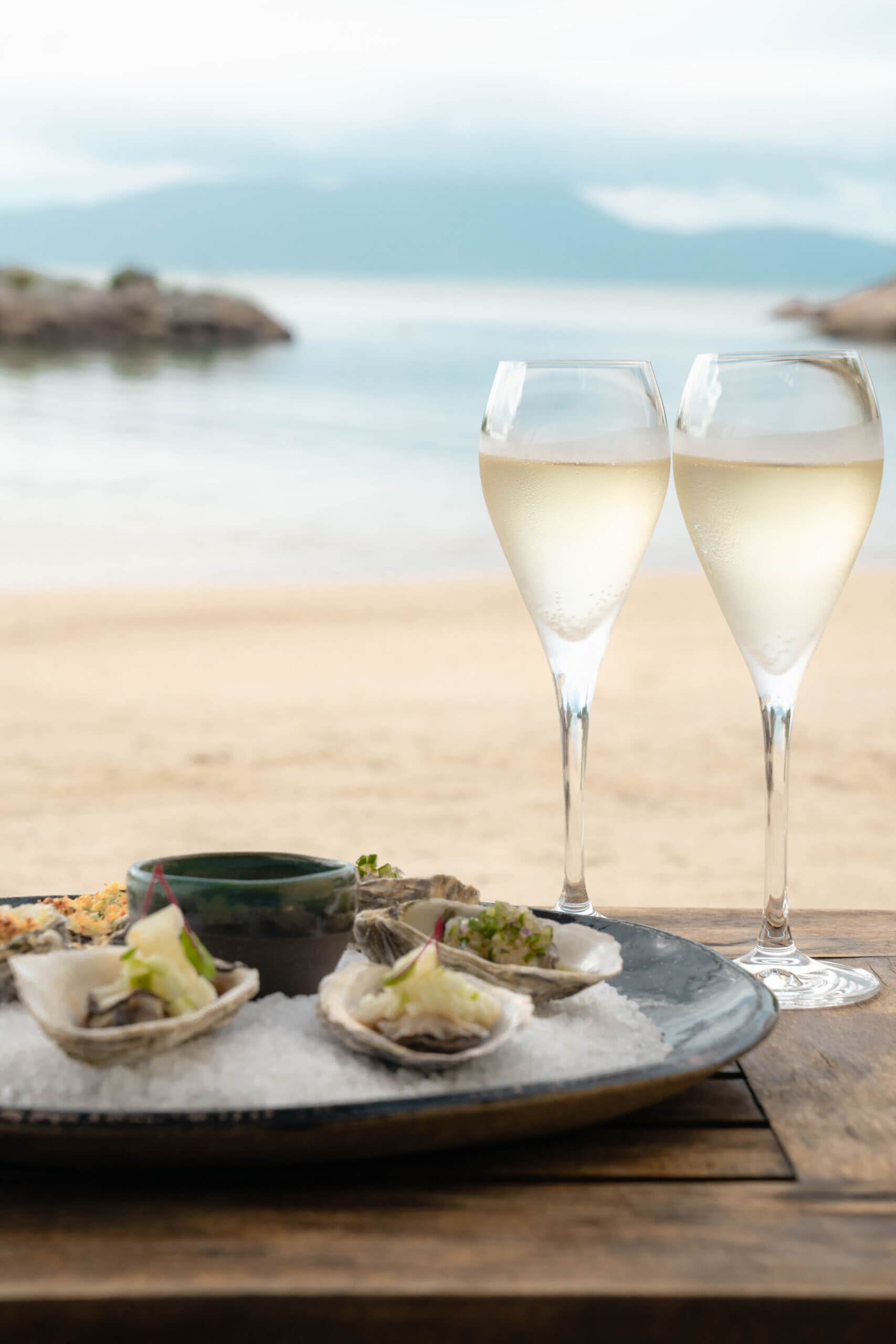 cocktails on the beach with fresh oysters in Brazil