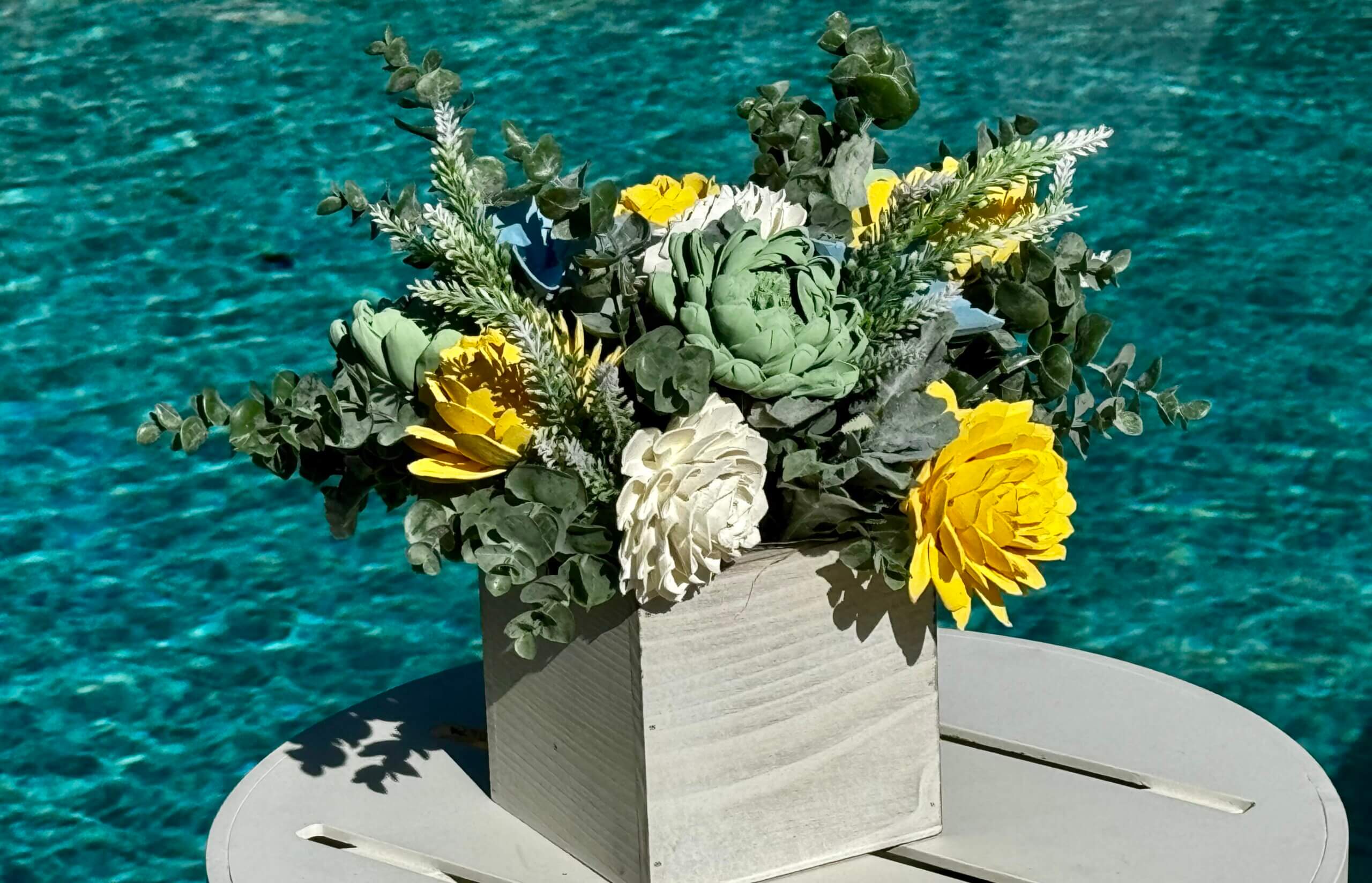 Sustainable wood flowers in a planter making a reusable arrangement