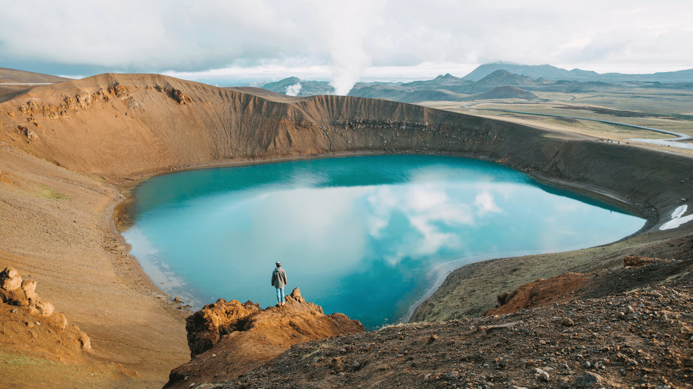 Iceland pool of blue water in a crater 