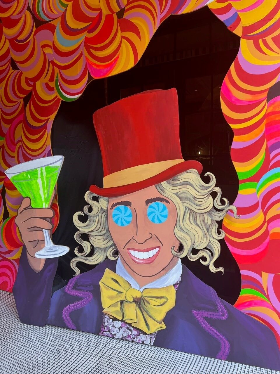 Painted Willy Wonka backdrop Holding a drink