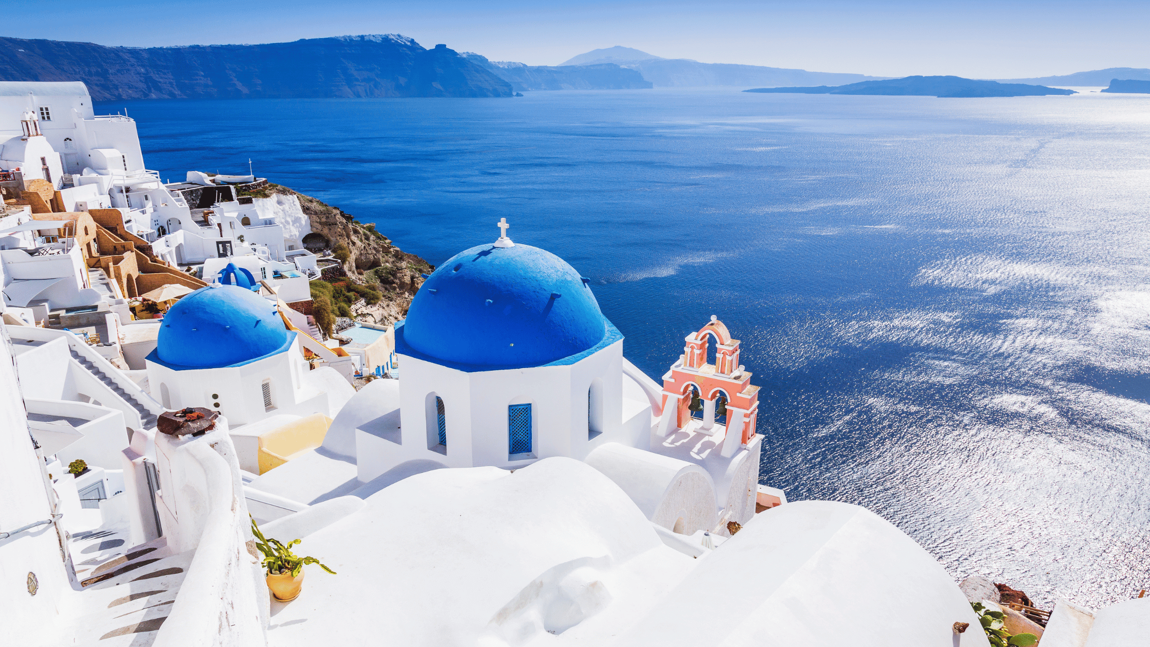 Iconic Blue roofs in the isle of Santorini in Greece