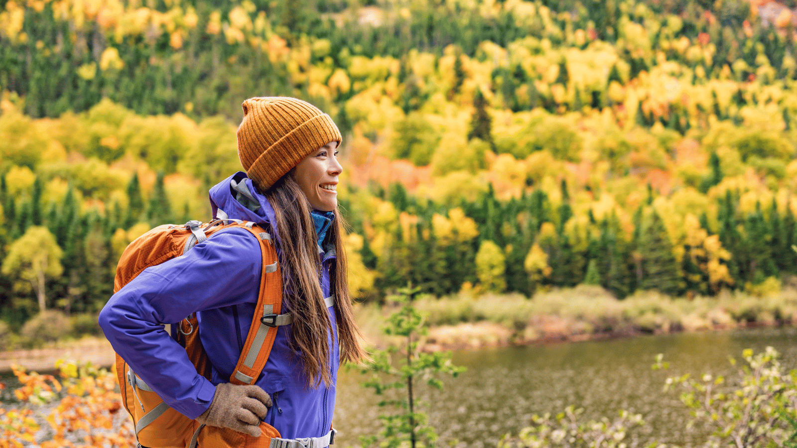 a hiker taking in her surroundings in Canada