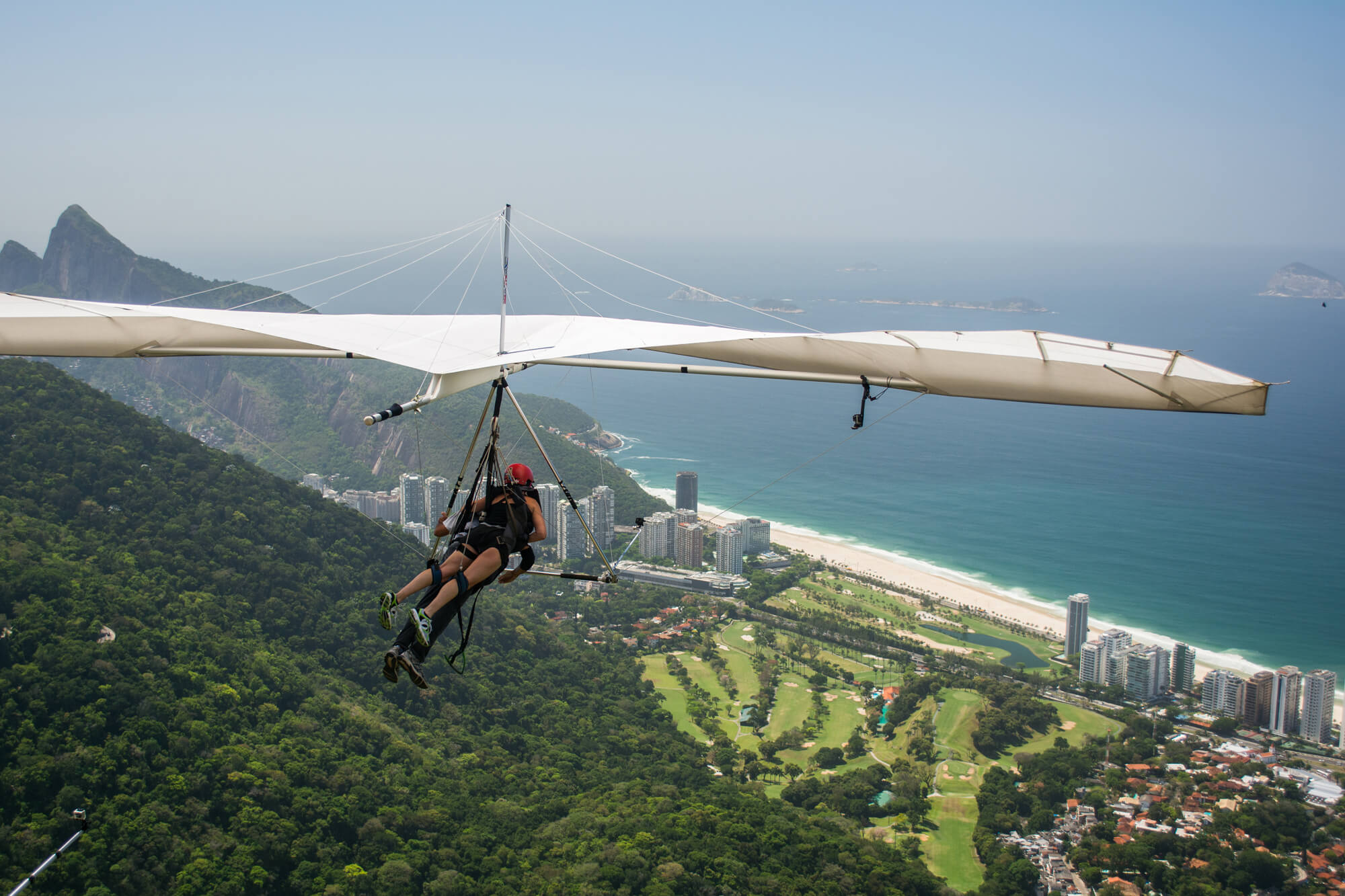 Paragliding in Brazil over the valley on Rio