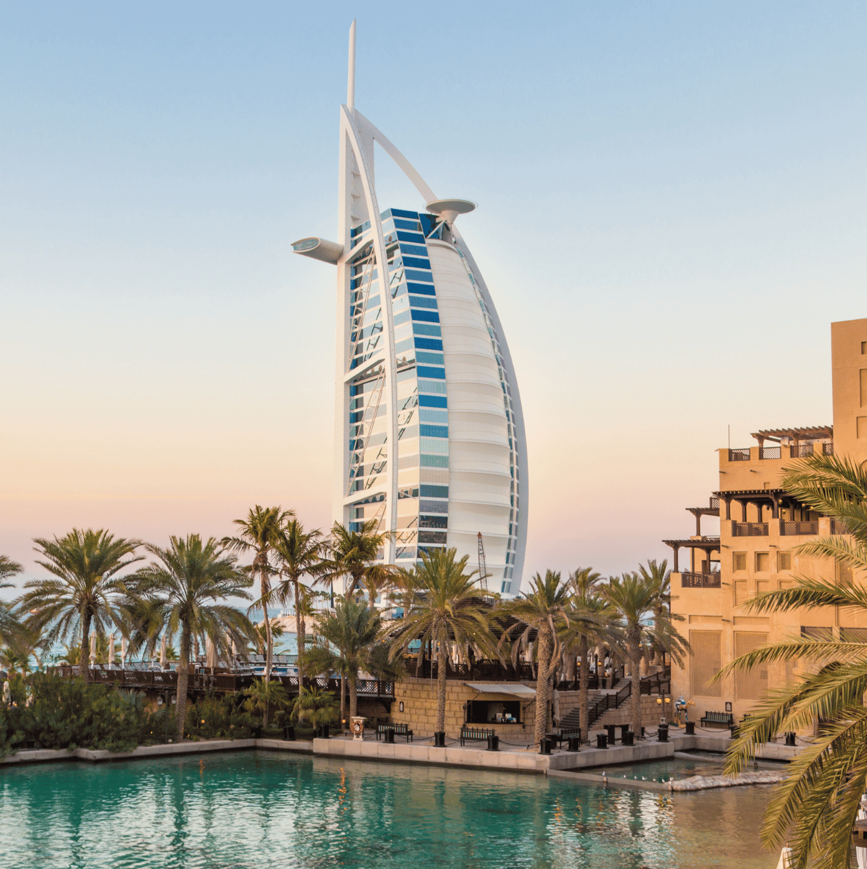 Burj Al Arab with water in front of it