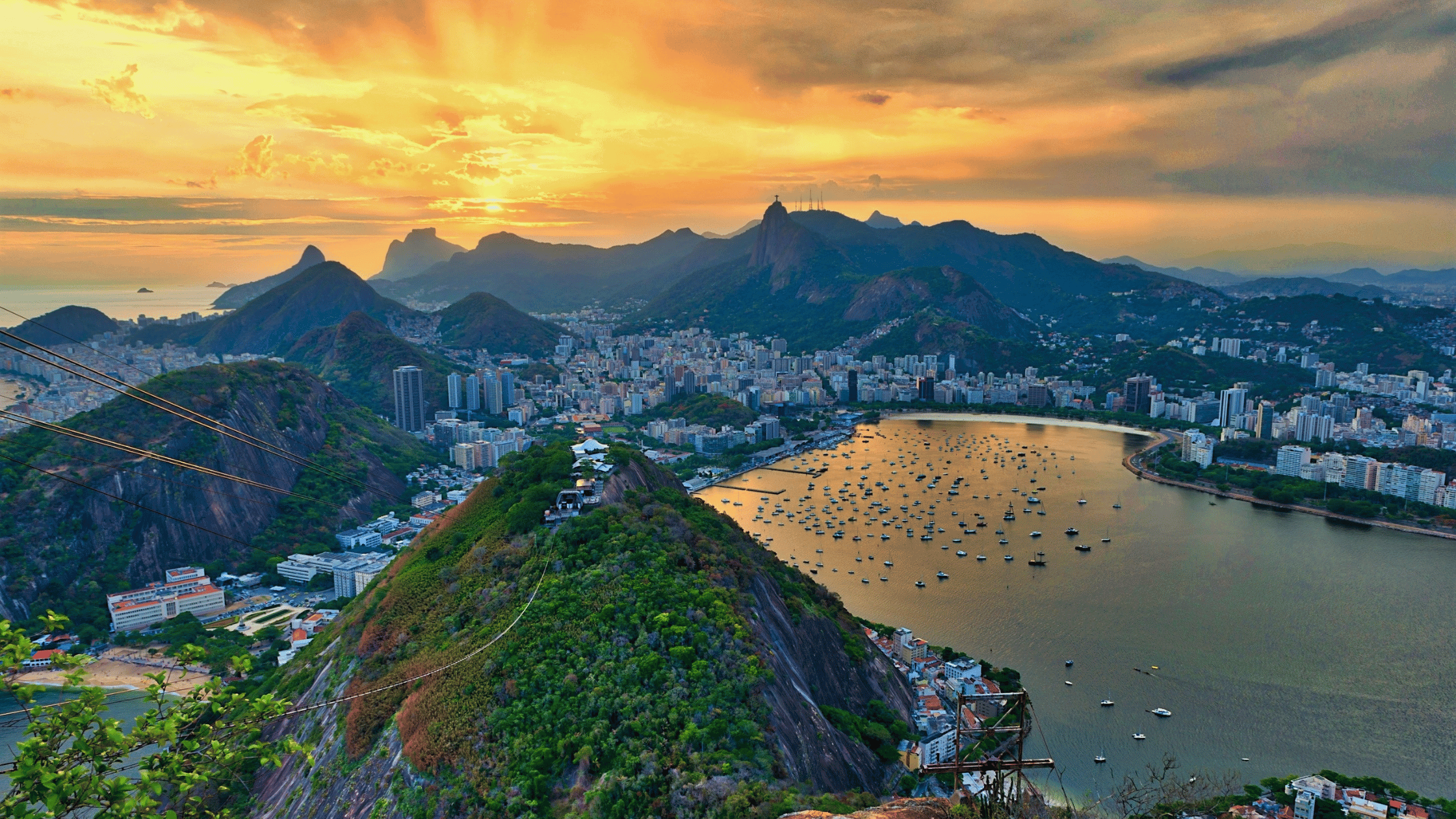 Aerial view of Rio Di Janeiro at sunset with an orange sky