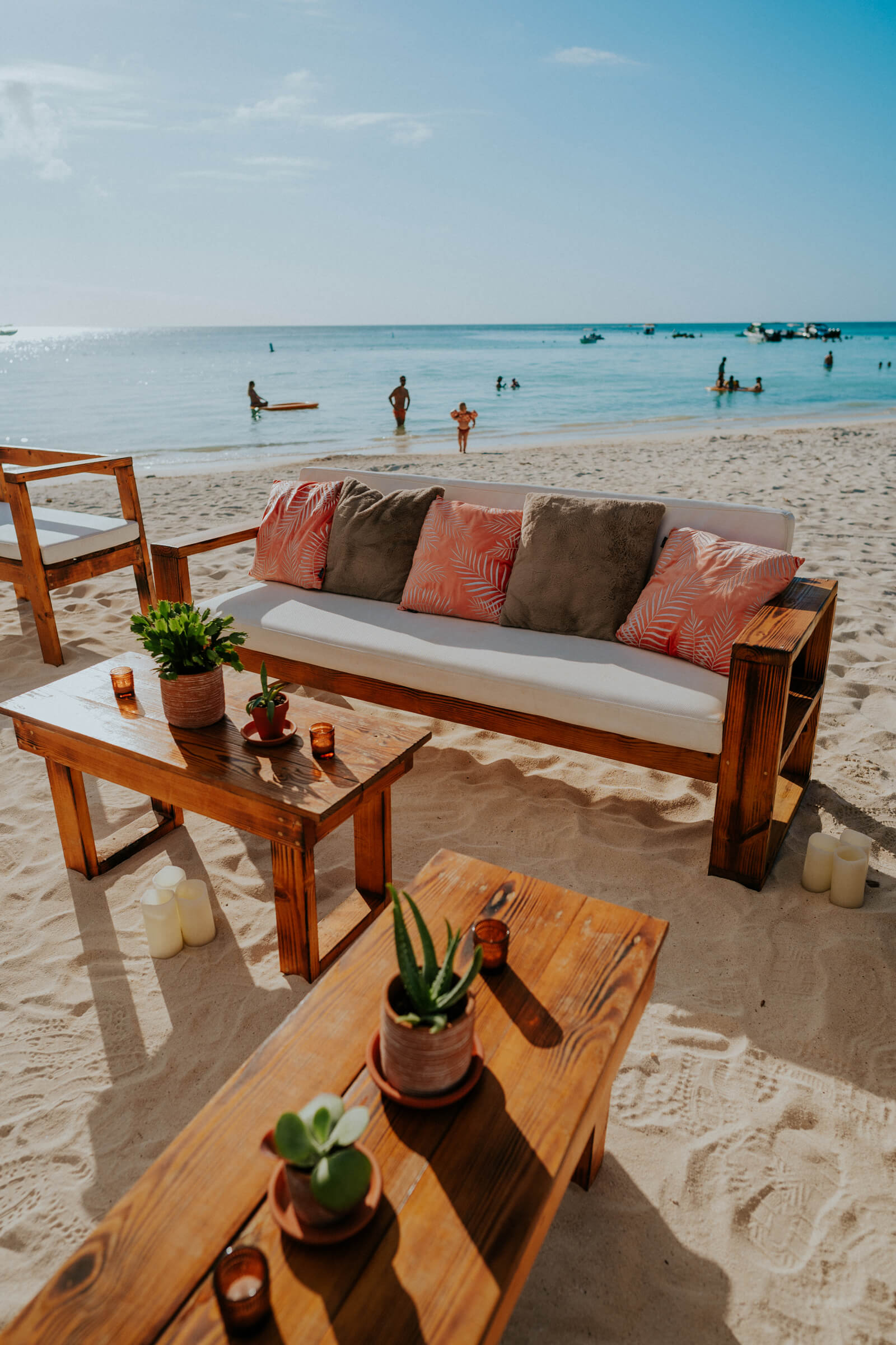 Urban beach set up with couch and pillows and table 